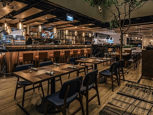 Wolfgang Puck Kitchen restaurant at SIN Airport